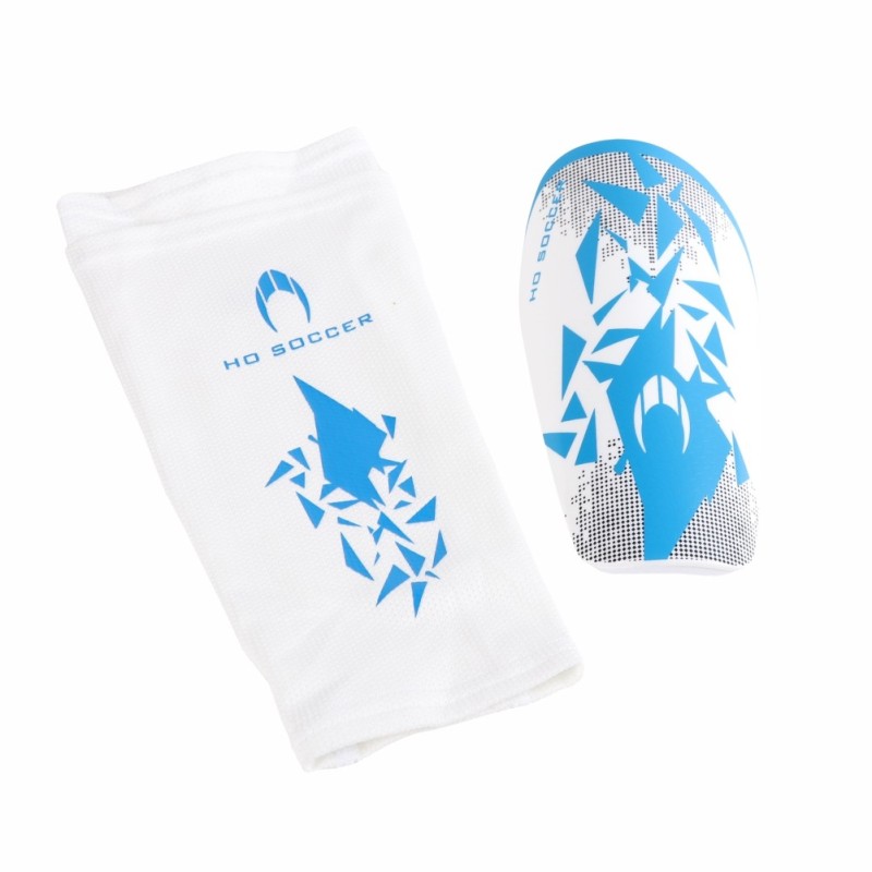Ho soccer Espinillera Rebel blanca/azul 2025