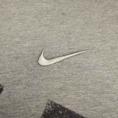 Nike Nike Primary SwooshCamiseta Dri-FIT versátil de manga corta - Hombre Libre de impuestos