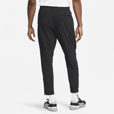 Nike Nike UnlimitedPantalón versátil con bajos con cremallera Dri-FIT ADV - Hombre Promoción por tiempo limitado