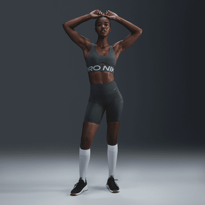 Nike Nike Pro Indy PlungeSujetador deportivo de sujeción media con almohadilla - Mujer Gran oferta