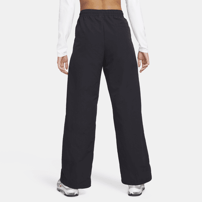 Nike Nike Sportswear Everything WovensPantalón de talle medio con dobladillo abierto - Mujer Últimos 3 días