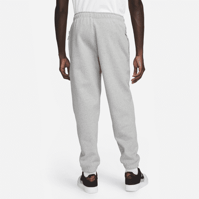 Nike Nike Solo SwooshPantalón de tejido Fleece - Hombre Envío internacional gratuito